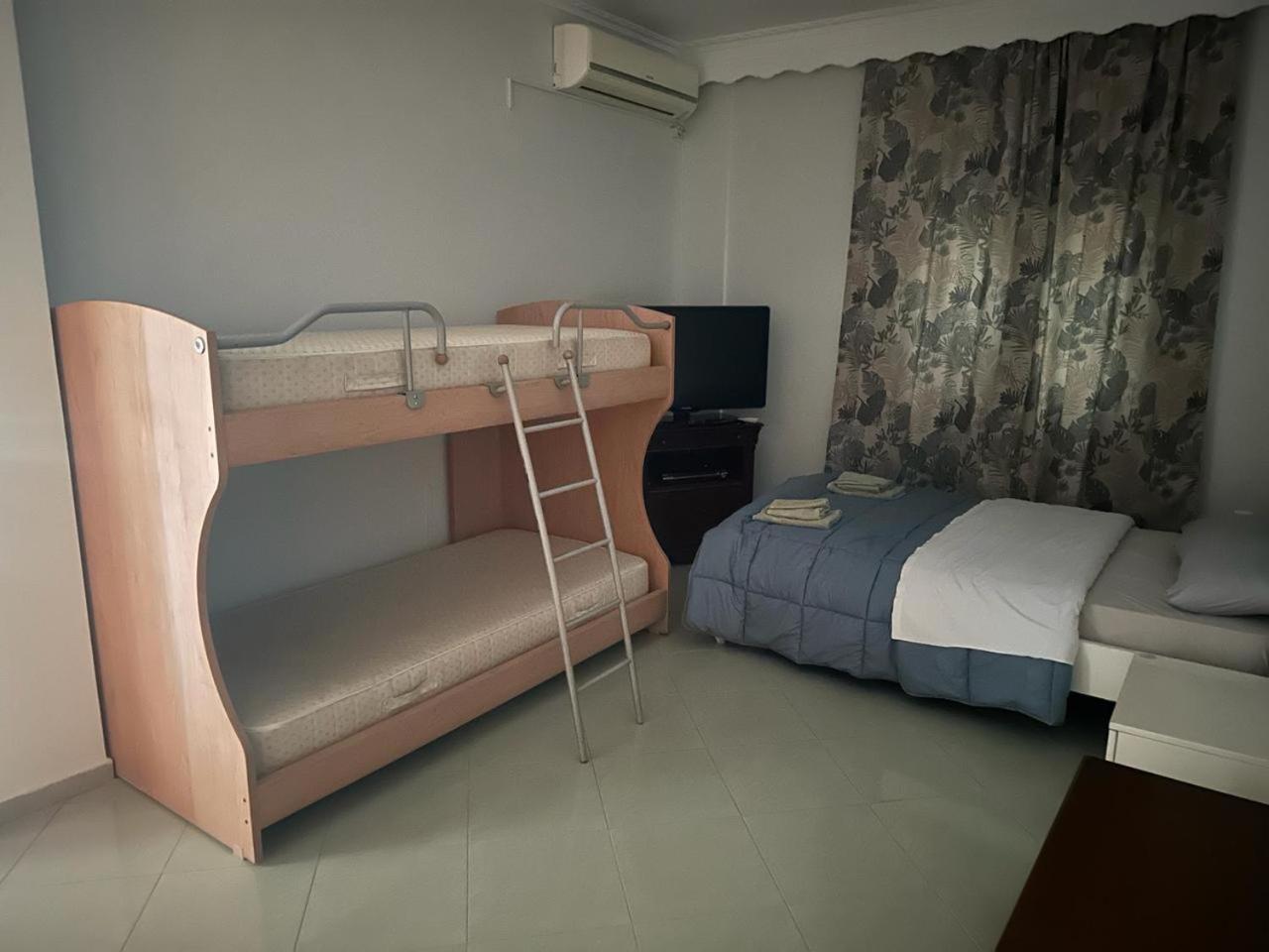 Carlos Apartment Артемида Екстериор снимка